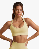 SUPER SCULPT SEAMLESS CROSS-BACK SPORTS BUTTER YELLOW