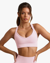 SUPER SCULPT SEAMLESS CROSS-BACK SPORTS POWDER PINK