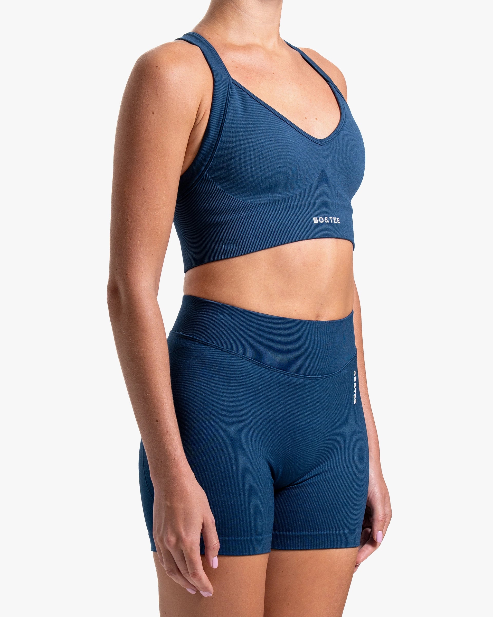 BO&TEE SUPER SCULPT SEAMLESS CROSS-BACK SPORTS BRA BLUE