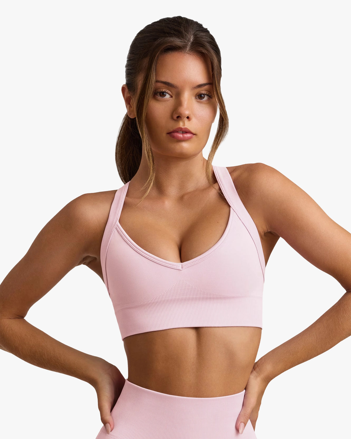 SUPER SCULPT SEAMLESS CROSS-BACK SPORTS POWDER PINK