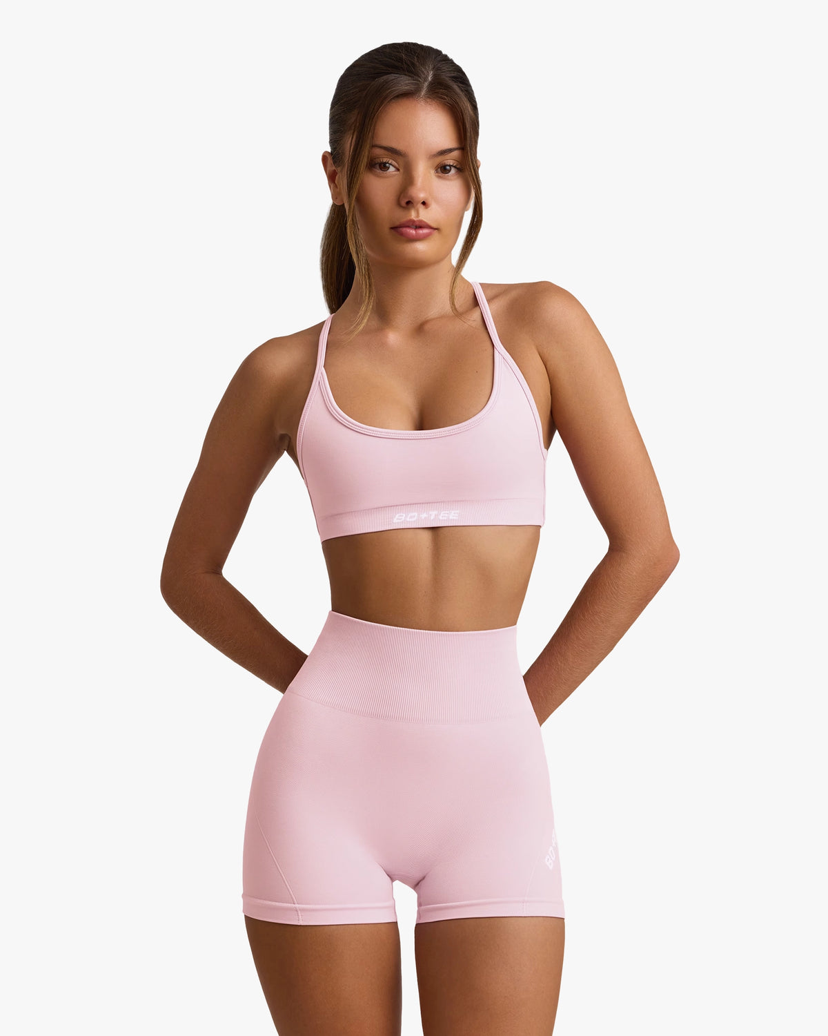 SUPER SCULPT SEAMLESS MINI SHORTS IN POWDER PINK